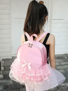Pink ballerina style children's dance backpack with glitter finish and lace tutu layers
