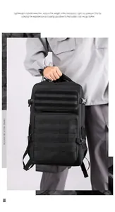 Detail of black tactical travel backpack with Molle system and reinforced handle