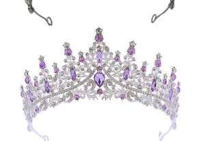 Detailed macro view of purple crystal rhinestones and intricate silver alloy tiara pattern