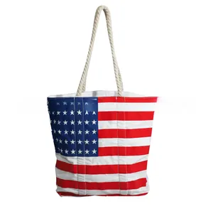 Detail of USA flag tote bag showing quilted canvas texture and thick rope handles