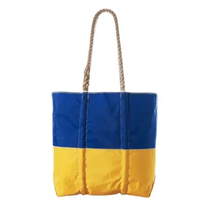 Blue and yellow tote bag with thick rope handles and large capacity storage design