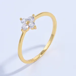 Close-up of S925 hallmark on 18K gold plated silver ring with zircon floral design
