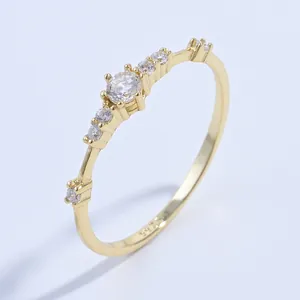 Elegant 18K gold plated S925 silver ring featuring a central zircon and side stones
