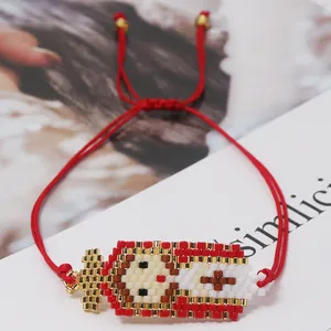 Handmade Miyuki bead bracelet with Virgin Mary motif on adjustable red woven cord