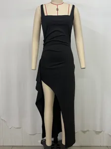 Detail view of square neck sleeveless black maxi dress with side ruching and high slit