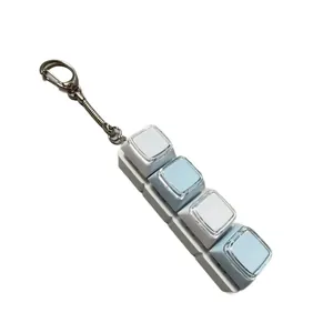 Mechanical keyboard fidget toy with 4 blue and white keys on a silver keychain