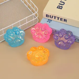 Cat paw stress relief toys set in blue pink purple orange with glitter details