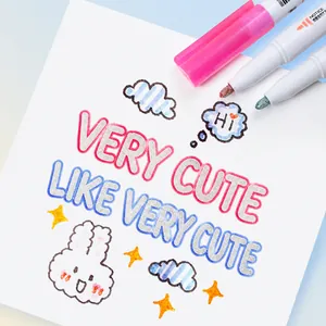 Detail of 12-color outline markers showing metallic silver ink with vibrant color borders