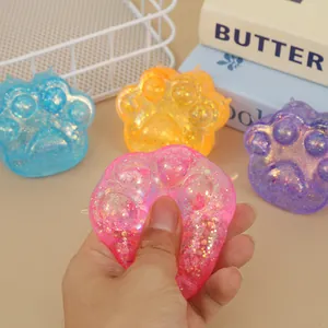 Cute squishy cat paw stress relief toys with colorful glitter in four vibrant colors