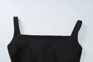 Detail of black square neck tank top with wide shoulder straps in ribbed knit fabric