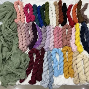 Cheesecloth table runner in assorted colors with bohemian crinkle texture for wedding decor
