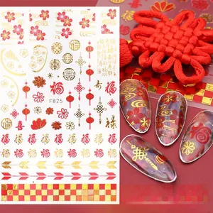 Makro-Detail der F825 3D-Nagelaufkleber mit chinesischem Fu-Zeichen und Goldmotiven