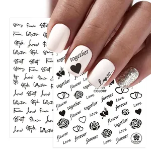 Valentine's Day nail stickers with black rose and heart patterns on female hands