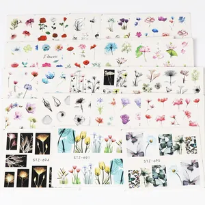 Detailed view of water decals stickers set with floral, butterfly and leaf patterns