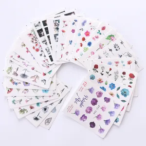 Watercolour purple flower and butterfly nail art sticker set with 12 unique elements