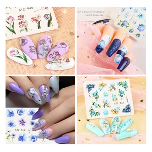 Detail of floral nail art stickers showing tulip and rose patterns with SKU STZ labels