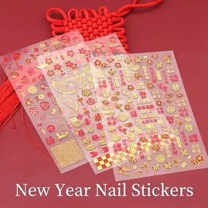 Neujahrs-Nagelaufkleber im chinesischen Stil mit roten und goldenen Glücksmustern