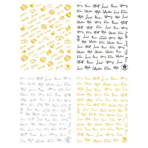 Nail art stickers set featuring gold and silver roses, hearts and cursive letters