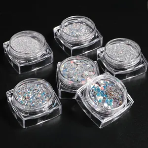 Set of 6 jars with silver holographic nail glitter powder and hexagonal sequins