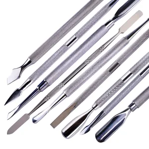 Macro detail of stainless steel nail pusher tools with non-slip handles and various tips