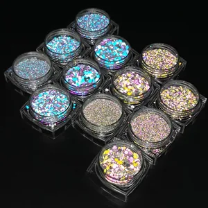 Macro shot of 12 jars of reflective holographic nail glitter with hexagon sequins