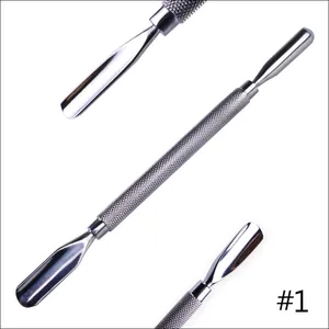 Close-up of double-ended stainless steel cuticle pusher with non-slip knurled handle
