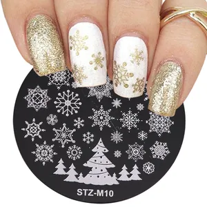 Detail of STZ-M10 nail stamping plate featuring intricate Christmas snowflakes and trees