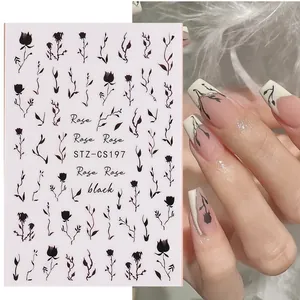 Dettaglio di adesivi 3D per unghie con rose nere applicati su manicure francese