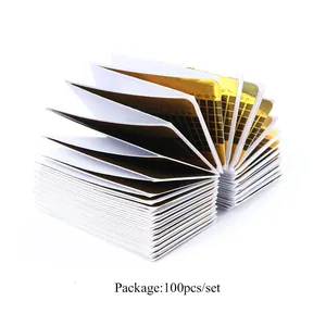 100pcs golden rectangular nail extension forms with black scale grid on white background