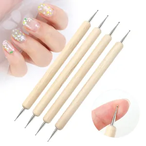 Set of 4 double-ended wooden dotting tools with metal ball tips for creative nail art