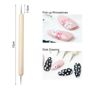 Close-up of double-headed wooden nail art dotting tool with 13cm length measurement