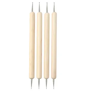 Set of 4 double-ended wooden dotting tools with varying metal ball tips for nail art