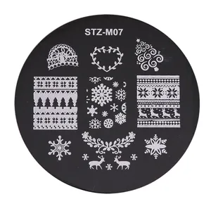 Plaque de stamping nail art Noël STZ-M07 avec motifs flocons et rennes