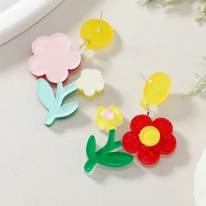 Colorful asymmetrical acrylic floral earrings with vibrant petals for a fresh summer look