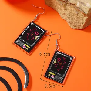 Detail view showing dimensions of black acrylic VHS tape earrings with pink lettering