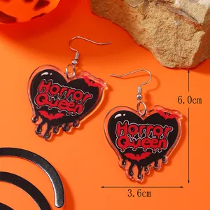 Detail shot of Horror Queen heart earrings with size markers 6.0cm and 3.6cm