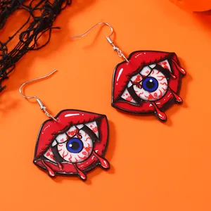 Creepy Halloween red lips and bloodshot eyeball earrings for spooky holiday parties