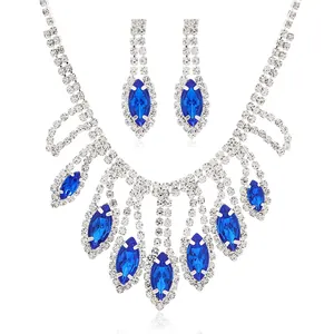 Elegant bridal necklace and earring set with blue marquise crystals and silver tassels