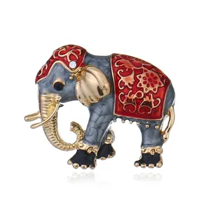 Detailed luxury elephant brooch with grey marble texture and red enamel accents
