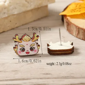 Detail view of cartoon dragon wooden earrings with 1.3cm height and 1.6cm width dimensions