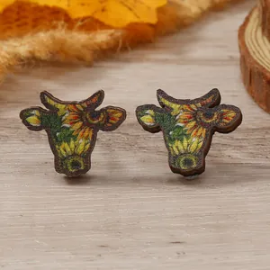 Bull head sunflower stud earrings with a rustic wooden texture and vibrant floral print