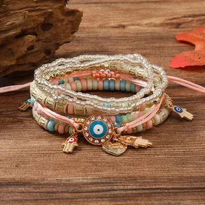 Boho-Mehrlagen-Perlenarmband Set mit Bösem Blick und Hand der Fatima Anhänger