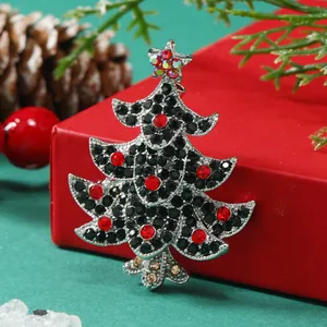 Christmas tree brooch with black and red crystals on silver alloy base in a festive gift box
