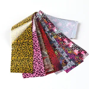 Detail view of assorted leopard and animal print nail transfer foils in vibrant colors