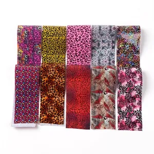 10 rolls of leopard and animal print nail art foil transfer stickers in various colors