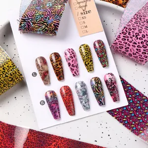 Close-up of leopard and zebra print nail foil transfer sheets for French manicure nail art
