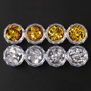 Macro detail of 8-pack gold and silver nail art sequins in heart star and round shapes