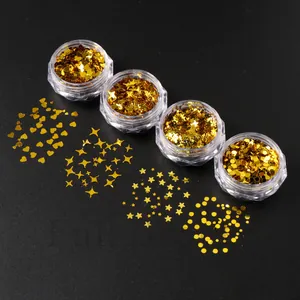 Detailed view of gold nail art sequins in heart, star, and dot shapes for DIY decor