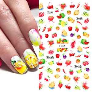 Dettaglio di adesivi per unghie a tema frutta con disegni di fragole e angurie ad acquerello
