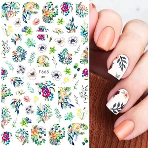Autocollants 3D pour ongles avec fleurs à l'aquarelle et finition de manucure orange